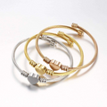 Gold Stainless Steel Heart Charm Bangle
